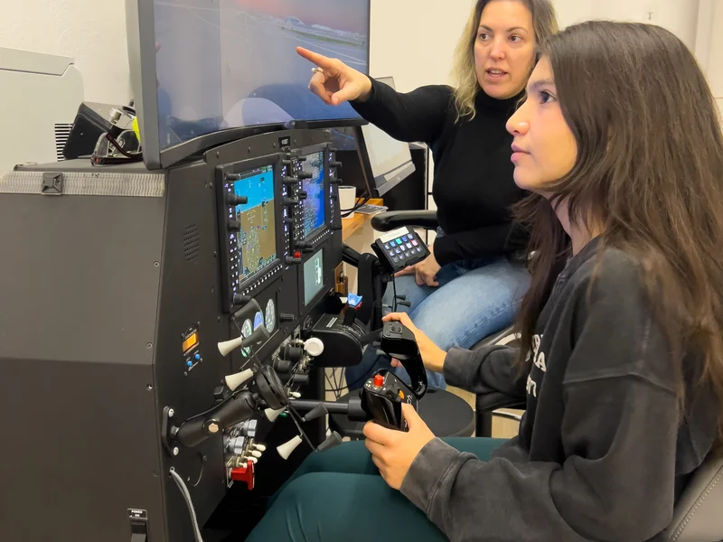 Kids learning to fly in FAA-approved flight simulator