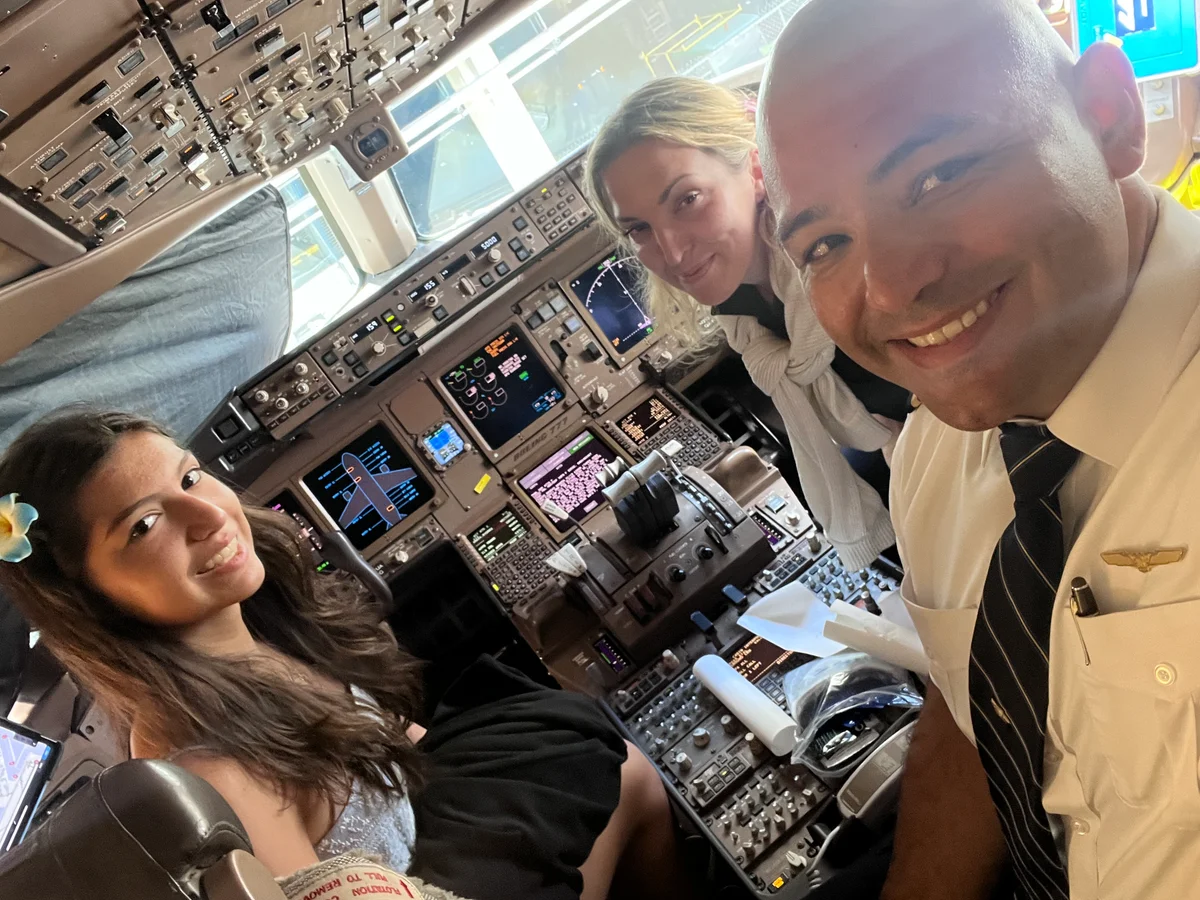 Julian Alarcon with his family on a Hawaii layover