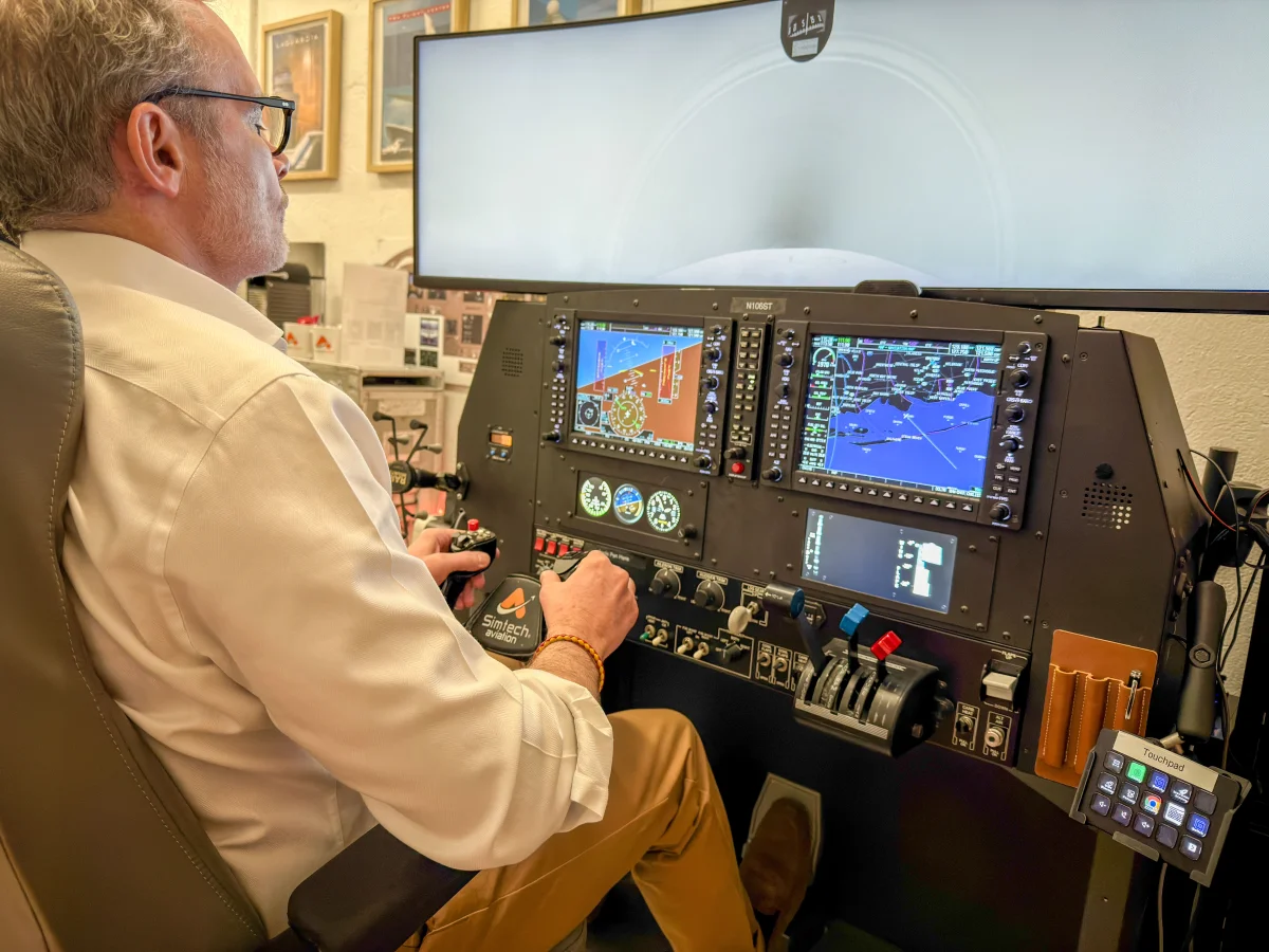 A pilot practicing at the Aviator.NYC G1000 NXi simulator